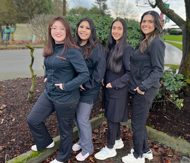 Four members of the Auburn Dental Smiles dental team