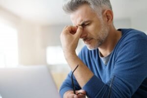 Man with a TMJ headache
